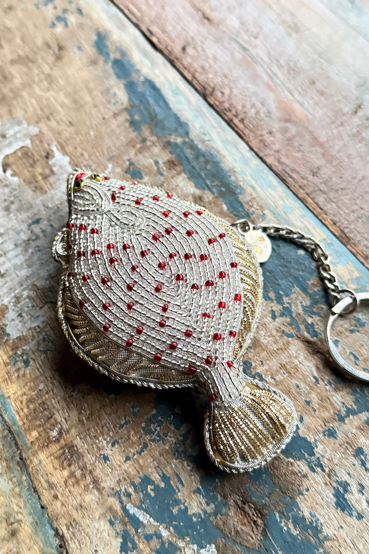 Perlenbestickter Schlüsselanhänger „Specht“