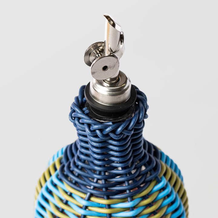 Håndflettet olieflaske